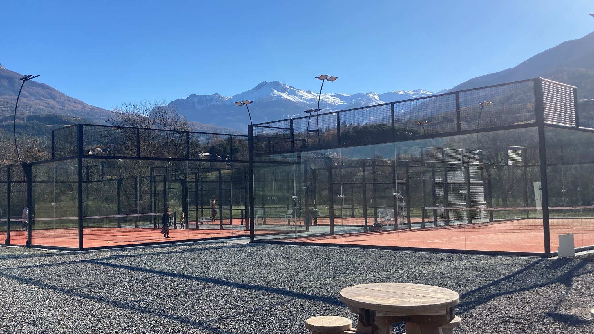 Padel courts at La Bartavelle with the Alps in the background